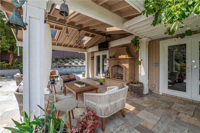 28852 Crestridge Rd, Rancho Palos Verdes, CA 90275 - view of patio / terrace featuring french doors and an outdoor living space with a fireplace