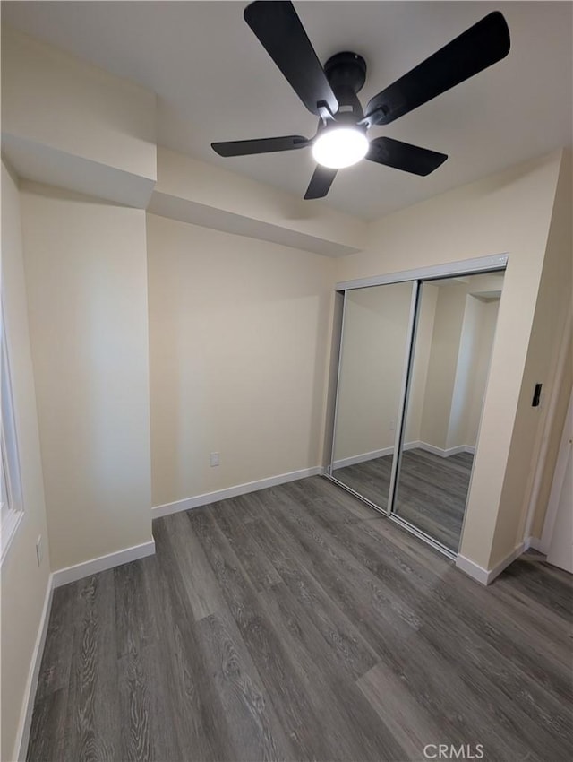 938 Stanley Ave, Long Beach, CA 90804 - unfurnished bedroom with baseboards, wood finished floors, ceiling fan, and a closet