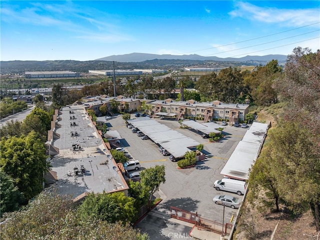 birds eye view of property featuring a mountain view