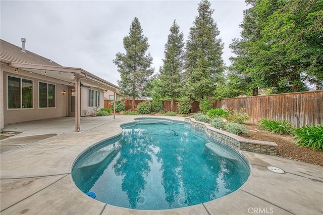 view of pool featuring a fenced in pool, a patio, and a fenced backyard