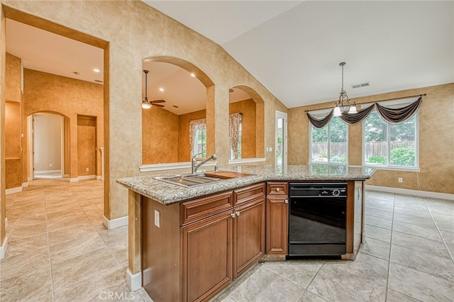 kitchen featuring a sink, black dishwasher, visible vents, baseboards, and arched walkways