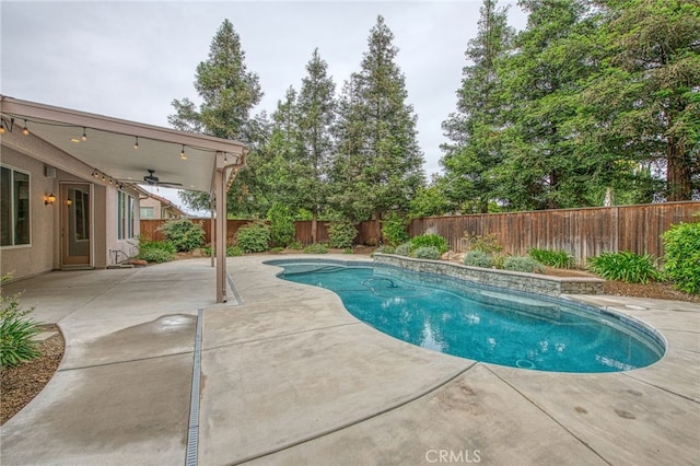 view of pool featuring a fenced in pool, a ceiling fan, a patio, and a fenced backyard