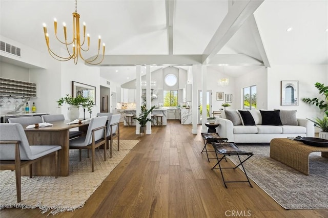 10815 San Marcos Rd, Atascadero, CA 93422 - living area featuring an inviting chandelier, visible vents, wood finished floors, beamed ceiling, and high vaulted ceiling