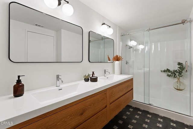 4490 Lubbock Dr Unit D, Simi Valley, CA 93063 - bathroom featuring visible vents, a sink, and a shower stall