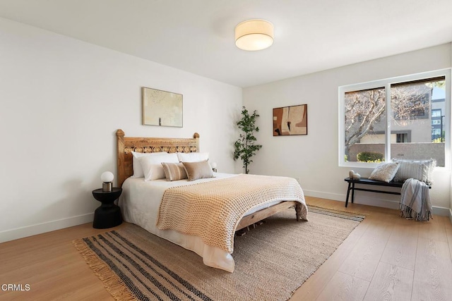 4490 Lubbock Dr Unit D, Simi Valley, CA 93063 - bedroom with baseboards and wood finished floors