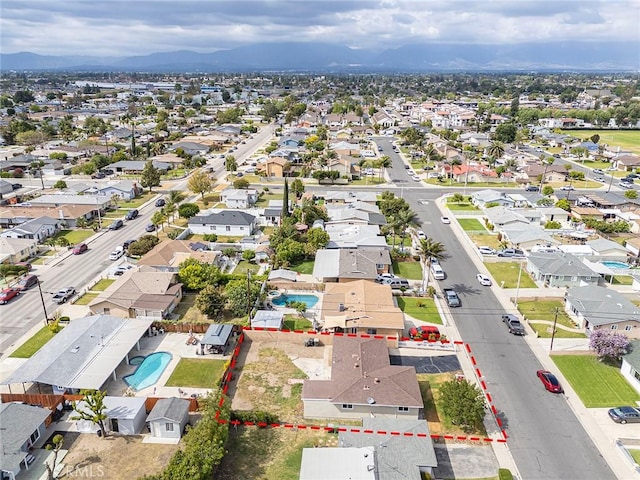 aerial view with a residential view and a mountain view