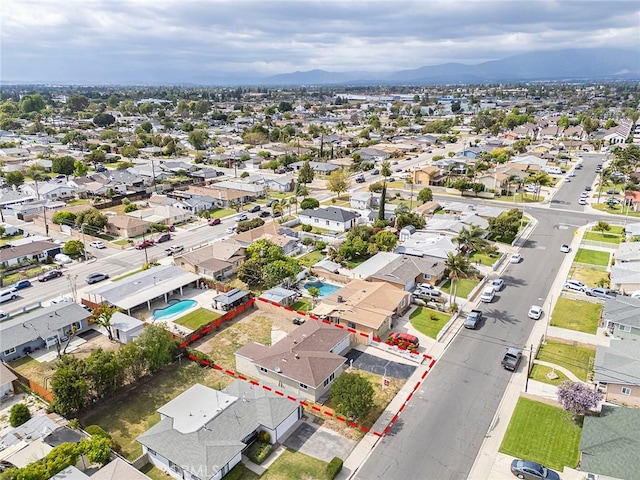 bird's eye view with a residential view and a mountain view
