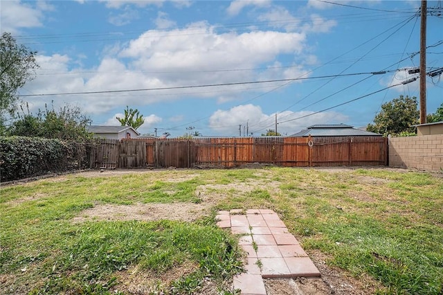 view of yard featuring a fenced backyard