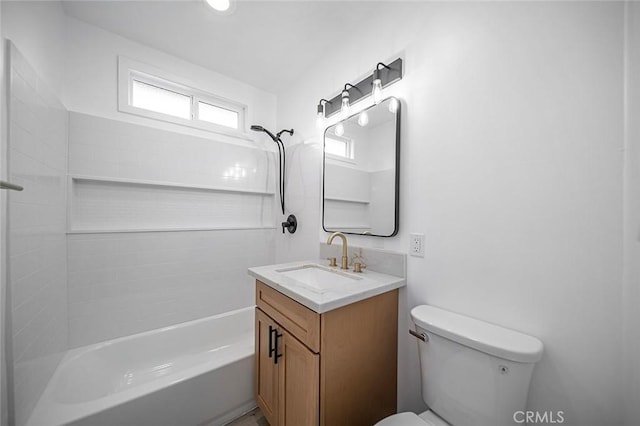 bathroom with toilet, shower / bath combination, and vanity