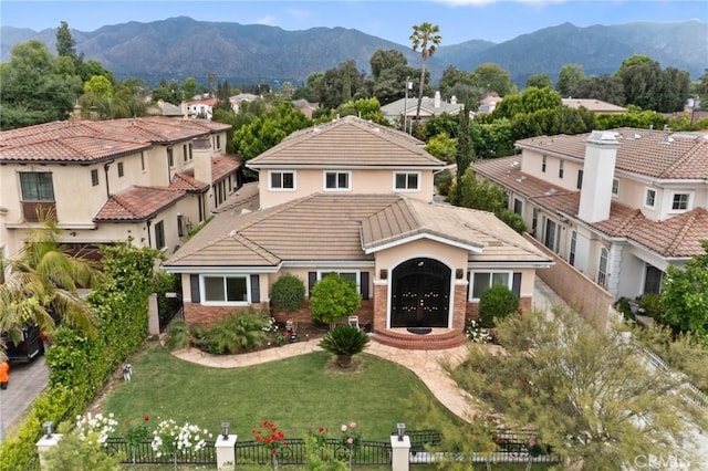 65 W Lemon Ave, Arcadia, CA 91007 - mediterranean / spanish-style house with a tile roof, a mountain view, stucco siding, and a residential view