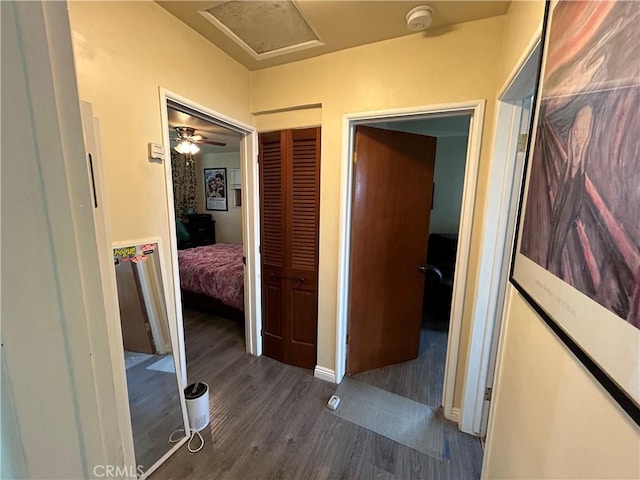 325 E 59th, Long Beach, CA 90805 - hallway with wood finished floors, baseboards, and attic access