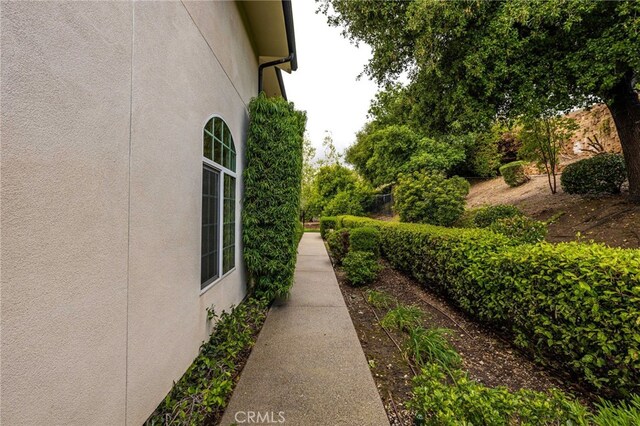 280 W 26th St, Upland, CA 91784 - view of side of property featuring stucco siding