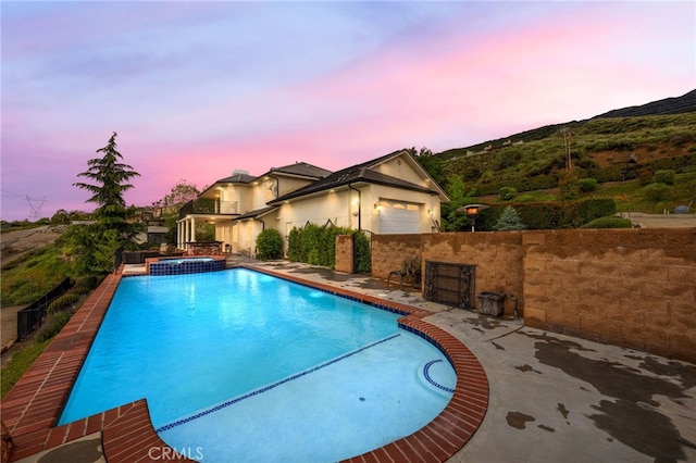 280 W 26th St, Upland, CA 91784 - view of pool featuring fence, a pool with connected hot tub, and a mountain view