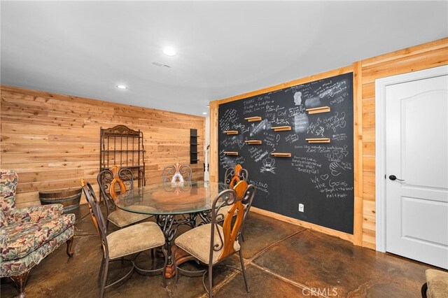 280 W 26th St, Upland, CA 91784 - dining area featuring wooden walls, concrete floors, and recessed lighting