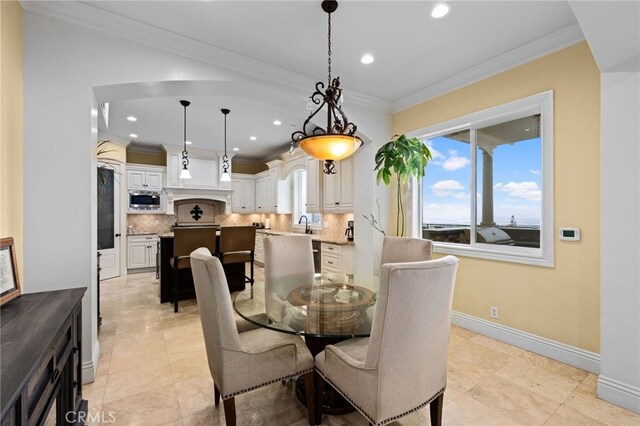 280 W 26th St, Upland, CA 91784 - dining room with crown molding, recessed lighting, and baseboards
