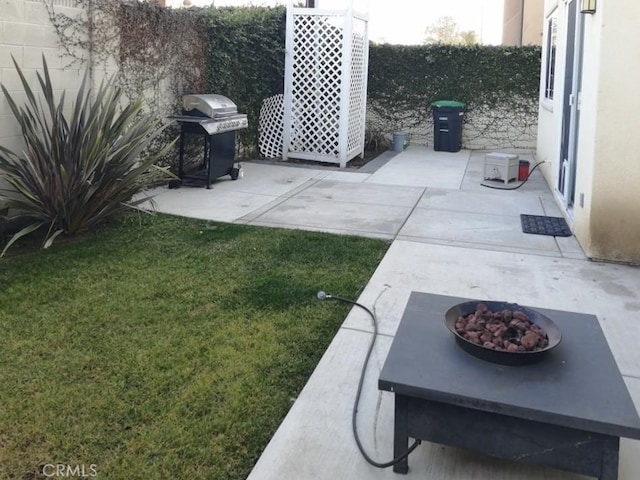 1027 Palmetto Way, Costa Mesa, CA 92626 - view of yard featuring a patio and an outdoor fire pit