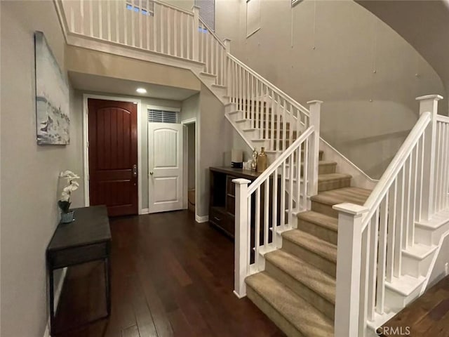 1027 Palmetto Way, Costa Mesa, CA 92626 - stairway with a high ceiling and wood finished floors