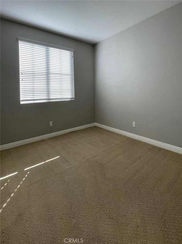 1027 Palmetto Way, Costa Mesa, CA 92626 - unfurnished room featuring baseboards and carpet flooring