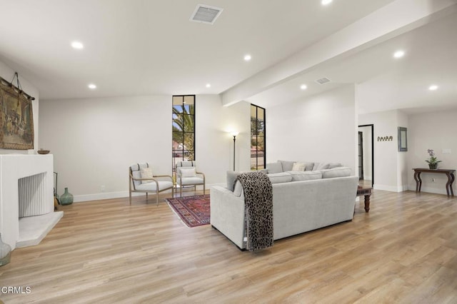 1820 Ramona Dr, Camarillo, CA 93010 - living room featuring recessed lighting, baseboards, visible vents, and light wood-type flooring