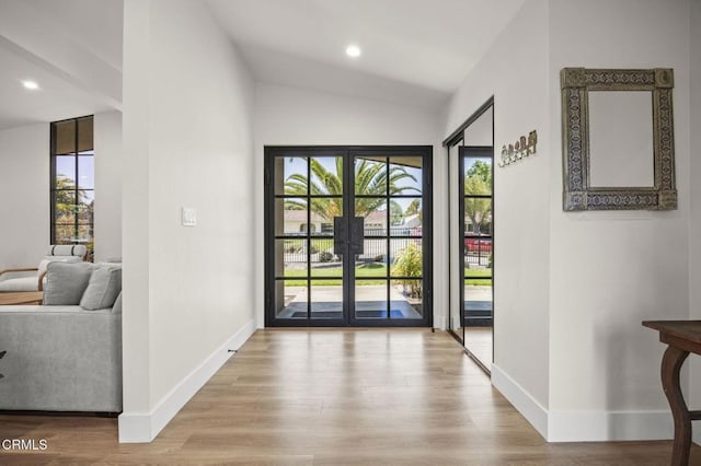 1820 Ramona Dr, Camarillo, CA 93010 - entryway featuring recessed lighting, baseboards, vaulted ceiling, and light wood finished floors