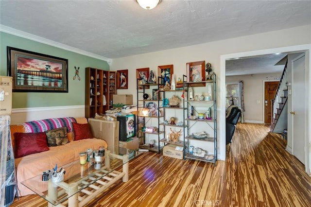 24851 Stem Ave, Lake Forest, CA 92630 - living area with wood finished floors, stairs, baseboards, ornamental molding, and a textured ceiling