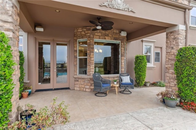 view of patio / terrace with french doors and a ceiling fan