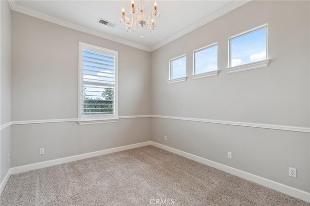 unfurnished room with visible vents, carpet flooring, a notable chandelier, and baseboards