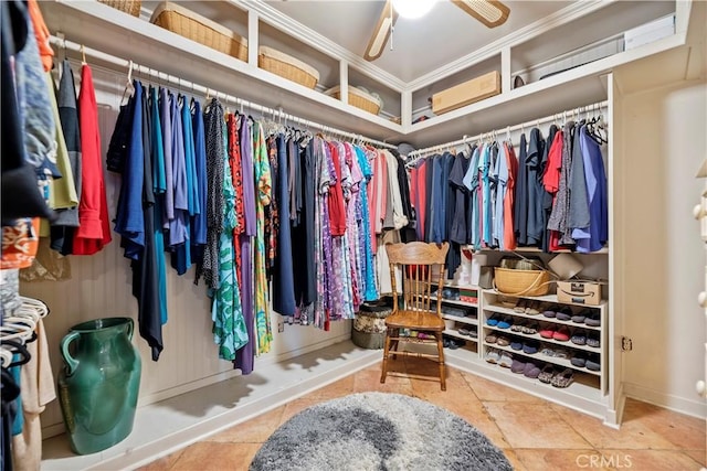 spacious closet featuring a ceiling fan