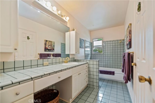 full bath with shower / tub combination, tile patterned flooring, and vanity