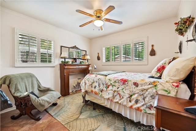bedroom with crown molding and ceiling fan