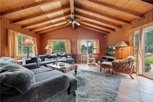 living room with wood walls, wooden ceiling, and light tile patterned floors