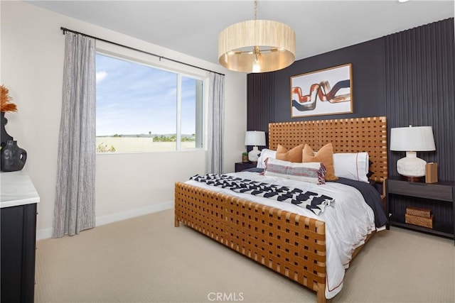 carpeted bedroom with baseboards