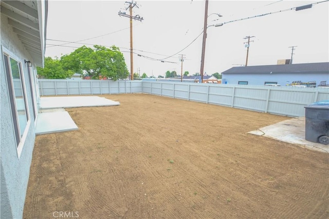 view of yard featuring a fenced backyard and a patio area
