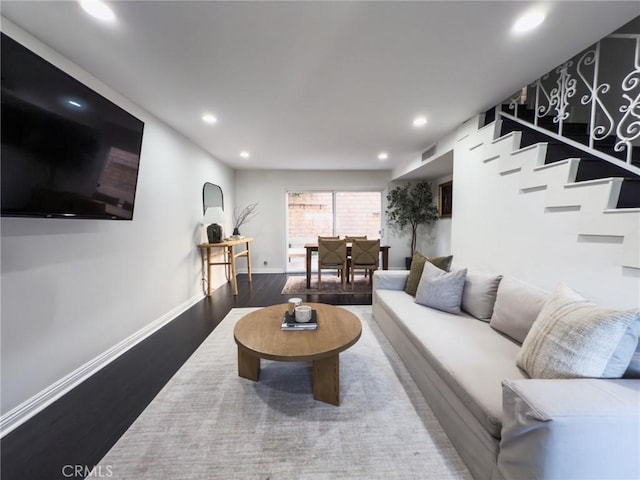 5275 Colodny Dr Unit 4, Agoura Hills, CA 91301 - living room with wood finished floors, recessed lighting, baseboards, and stairway