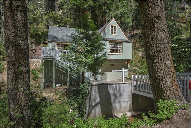 230 Fremont Rd, Lake Arrowhead, CA 92352 - rear view of property with stairway and a wooden deck