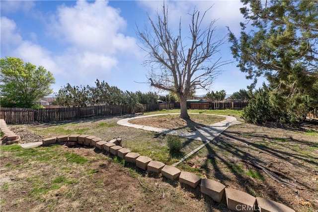 15631 Via Cartagena St, Hesperia, CA 92345 - view of yard featuring a fenced backyard