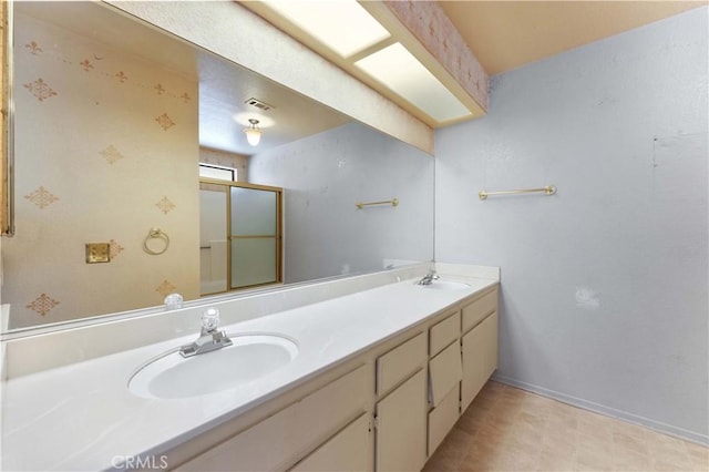 15631 Via Cartagena St, Hesperia, CA 92345 - bathroom featuring an enclosed shower, a sink, double vanity, and baseboards