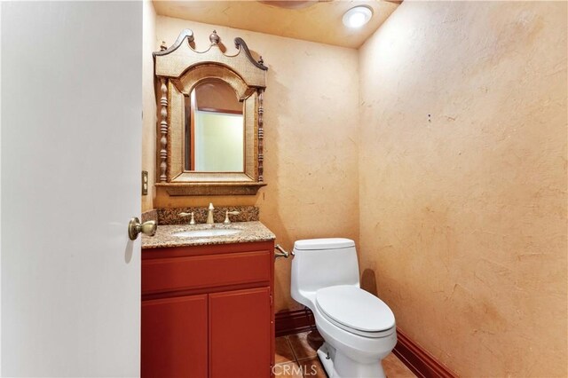 15631 Via Cartagena St, Hesperia, CA 92345 - bathroom featuring toilet, tile patterned flooring, and vanity