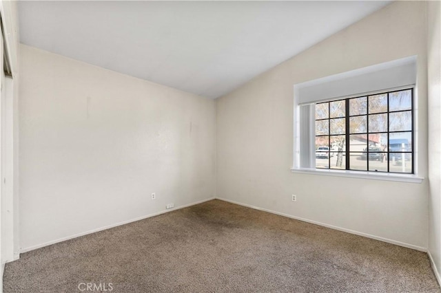 15631 Via Cartagena St, Hesperia, CA 92345 - carpeted empty room featuring lofted ceiling and baseboards