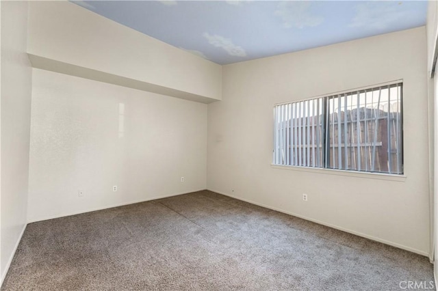 15631 Via Cartagena St, Hesperia, CA 92345 - spare room with baseboards and carpet