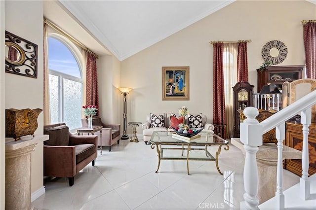 living area with light tile patterned floors, lofted ceiling, and a wealth of natural light