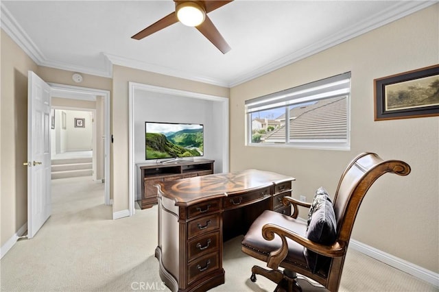 office area with ceiling fan, light colored carpet, ornamental molding, and baseboards