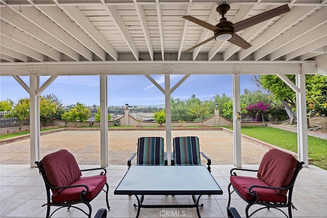 view of patio / terrace featuring a fenced backyard and ceiling fan