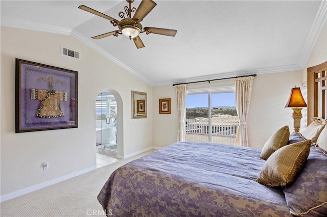 bedroom featuring visible vents, lofted ceiling, access to outside, arched walkways, and carpet flooring