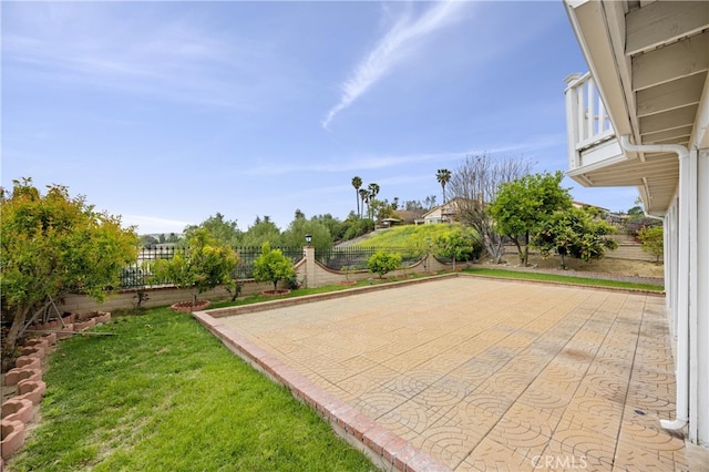 exterior space with a yard and a fenced backyard
