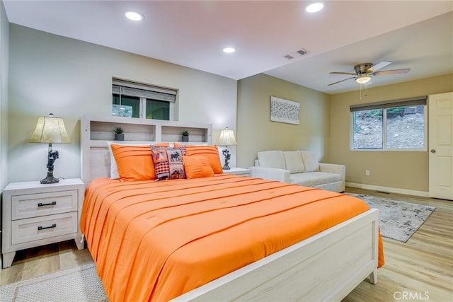 26131 Lake Forest Dr, Twin Peaks, CA 92391 - bedroom featuring wood finished floors, baseboards, recessed lighting, and a ceiling fan