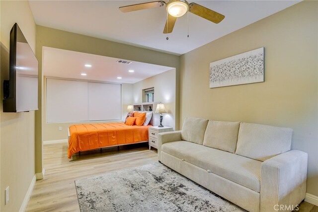 26131 Lake Forest Dr, Twin Peaks, CA 92391 - bedroom featuring wood finished floors, baseboards, recessed lighting, and a ceiling fan