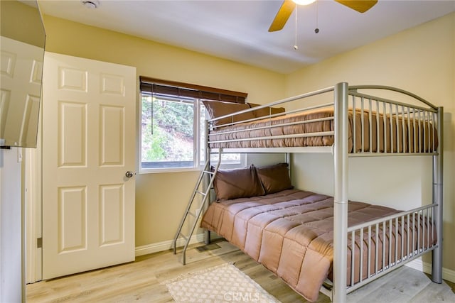26131 Lake Forest Dr, Twin Peaks, CA 92391 - bedroom featuring wood finished floors, baseboards, and a ceiling fan