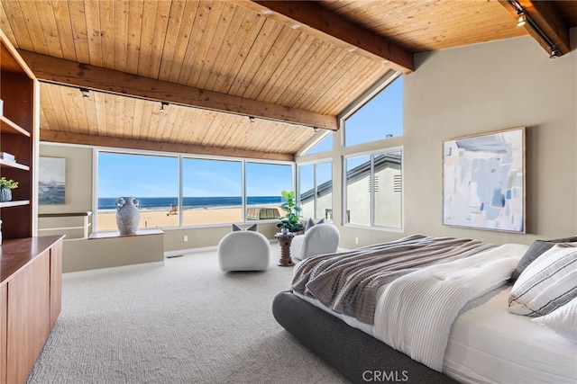 carpeted bedroom featuring wood ceiling, a water view, vaulted ceiling with beams, and multiple windows