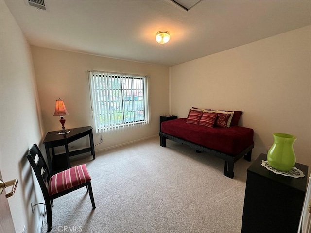 bedroom featuring carpet floors and visible vents